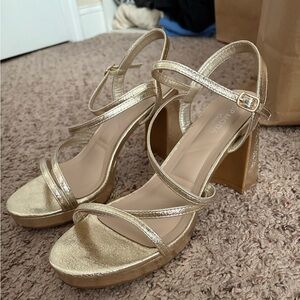 Gold strappy heels